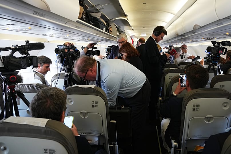 Journalists inside the papal flight after take-off was delayed at Los Rodeos International Airport, 12 June, 2026