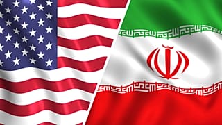 العلمان الأمريكي والإيراني