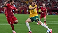 Turkey's Orkun Kokcu (6) and Australia's Cameron Burgess (21) battle for the ball during the World Cup Group D soccer match in Vancouver, Canada, Saturday, 13 June 2026.