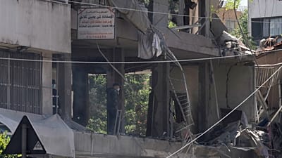 A man checks an apartment that was hit in an Israeli airstrike in Dahiyeh, Beirut's southern suburbs, Lebanon, Sunday, June 14, 2026.