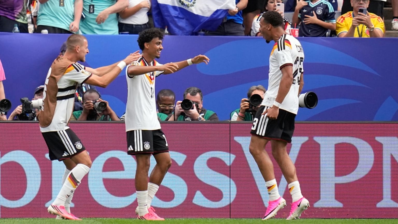 Germany's Nathaniel Brown celebrates with Felix Nmecha after scoring his side's fifth goal during the World Cup match against Curacao in Houston, Sunday, June 14, 2026