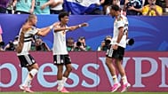 Germany's Nathaniel Brown celebrates with Felix Nmecha after scoring his side's fifth goal during the World Cup match against Curacao in Houston, Sunday, June 14, 2026