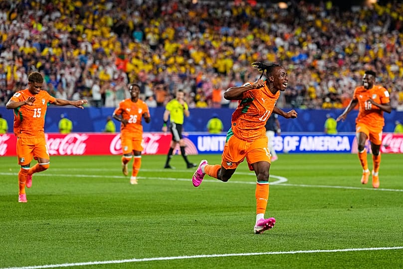 Ivory Coast's Yan Diomande celebrates teammate Amad Diallo's goal during the World Cup Group E match against Ecuador in Philadelphia, Sunday, June 14, 2026