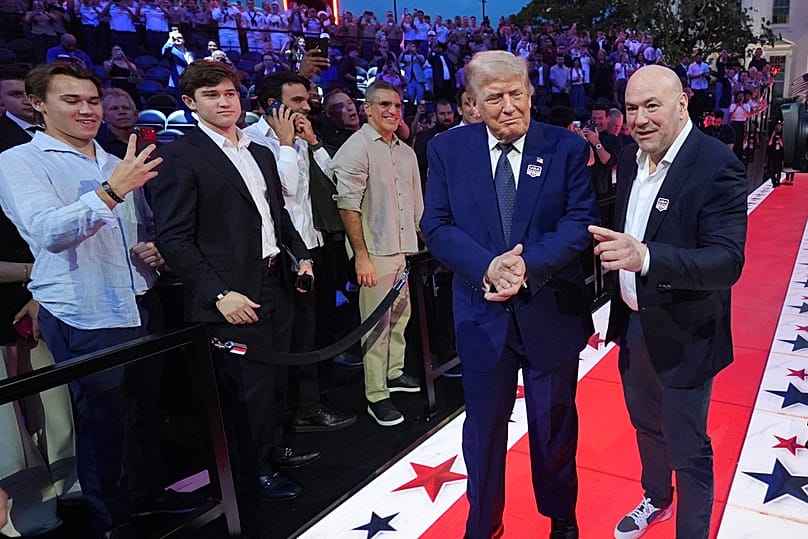 US President Donald Trump and Dana White, UFC president and CEO, arrive for UFC Freedom 250 on the South Lawn of the White House, Sunday, June 14, 2026, in Washington