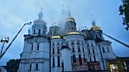 Rescue workers tries to put out a fire at the Kyiv-Pechersk Lavra, also known as the Monastery of the Caves, following a Russian strike in Kyiv, Ukraine, Monday, June 15, 2026