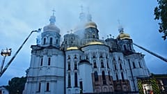 Rescue workers tries to put out a fire at the Kyiv-Pechersk Lavra, also known as the Monastery of the Caves, following a Russian strike in Kyiv, Ukraine, Monday, June 15, 2026