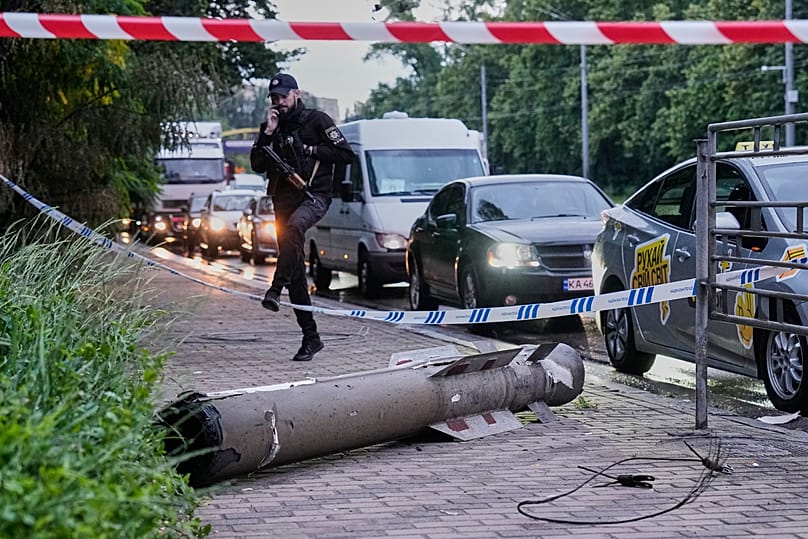 A missile fragment lies on the street following Russia's air attack in Kyiv, 15 June, 2026