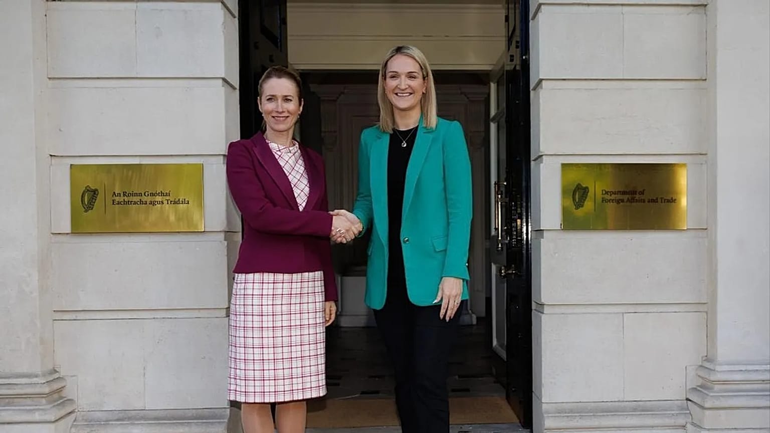 Kaja Kallas, left, shakes hands with Helen McEntee, Irish minister for foreign affairs, trade and defence..