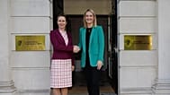 Kaja Kallas, left, shakes hands with Helen McEntee, Irish minister for foreign affairs, trade and defence..