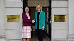 Kaja Kallas, left, shakes hands with Helen McEntee, Irish minister for foreign affairs, trade and defence..