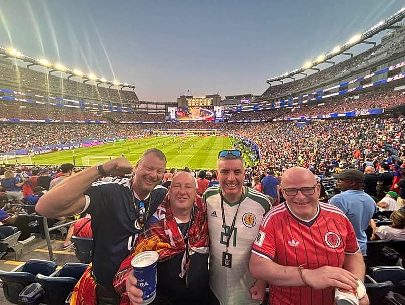 John Finnigan (second to right) attending Scotland vs Haiti