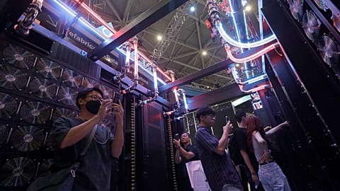 File- Visitors review DELTA's AI Modular Data Center at the Computex Taipei exhibition. 2 June 2026.