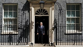 Britain's Prime Minister Keir Starmer steps out of 10 Downing Street.