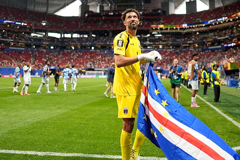 Cape Verde goalkeeper Vozinha celebrates as holds the flag of his country after the World Cup Group H soccer match between Spain and Cape Verde in Atlanta, Monday, June 15, 20