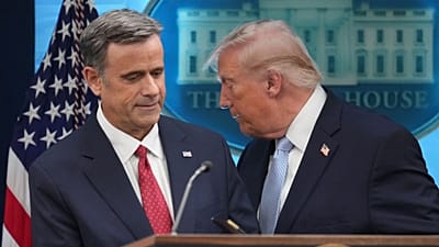 President Donald Trump moves from the podium to allow CIA Director John Ratcliffe to speak with reporters
