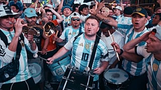 Fans of Argentina take part in a pre-match rally in support of Argentina national soccer team in Times Square, Monday, June 15, 2026, in New York. (AP Photo/Andres Kudacki)