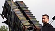 FILE: Volodymyr Zelenskyy stands in front of a Patriot air defence missile system in Western Pomerania, Germany, June 11, 2024.