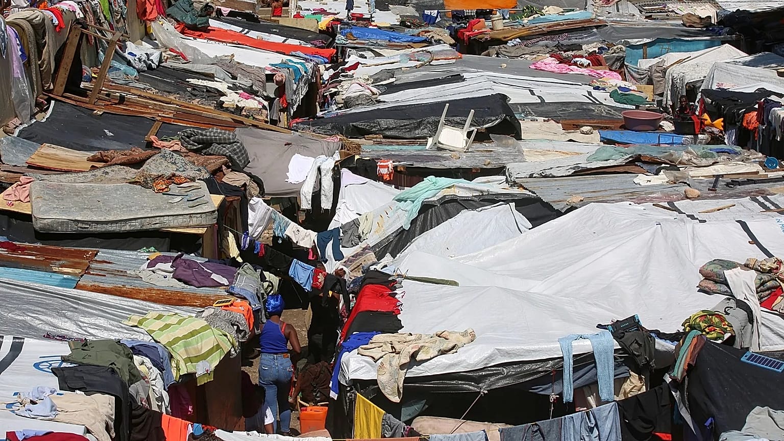 Makeshift tents fill a camp set up by people displaced from their homes by gang violence in Port-au-Prince, 14 April, 2025