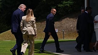 U.S. President Donald Trump, left, speaks with Italian Prime Minister Giorgia Meloni, second left, during the G7 summit in Evian-les-Bains, France, Tuesday, June 16, 2026.
