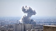 A plume of smoke rises after a strike in Tehran, 1 March 2026