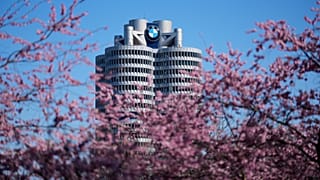 File - The headquarters of the car manufacturer BMW is pictured during cherry blossom season at Olympic Park in Munich, Germany, Friday, 3 April 2026.