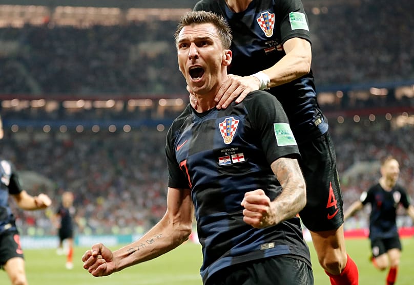 Croatia's Mario Mandzukic celebrates after scoring his side's second goal during the semifinal match between Croatia and England at the 2018 soccer World Cup.