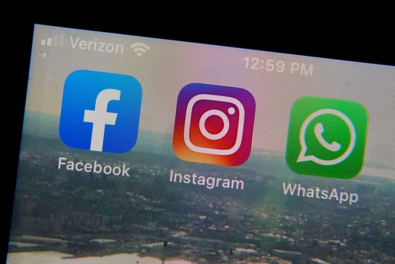 Mobile phone app logos for Facebook, Instagram and WhatsApp photographed in New York, 5 October, 2021