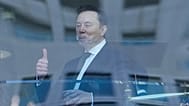 Elon Musk gestures as he walks through a hallway inside the US District Court in Oakland, 29 April, 2026