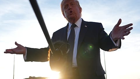 US President Donald Trump talks to the media after disembarking Air Force One at Paris Orly Airport, 17 June 2026