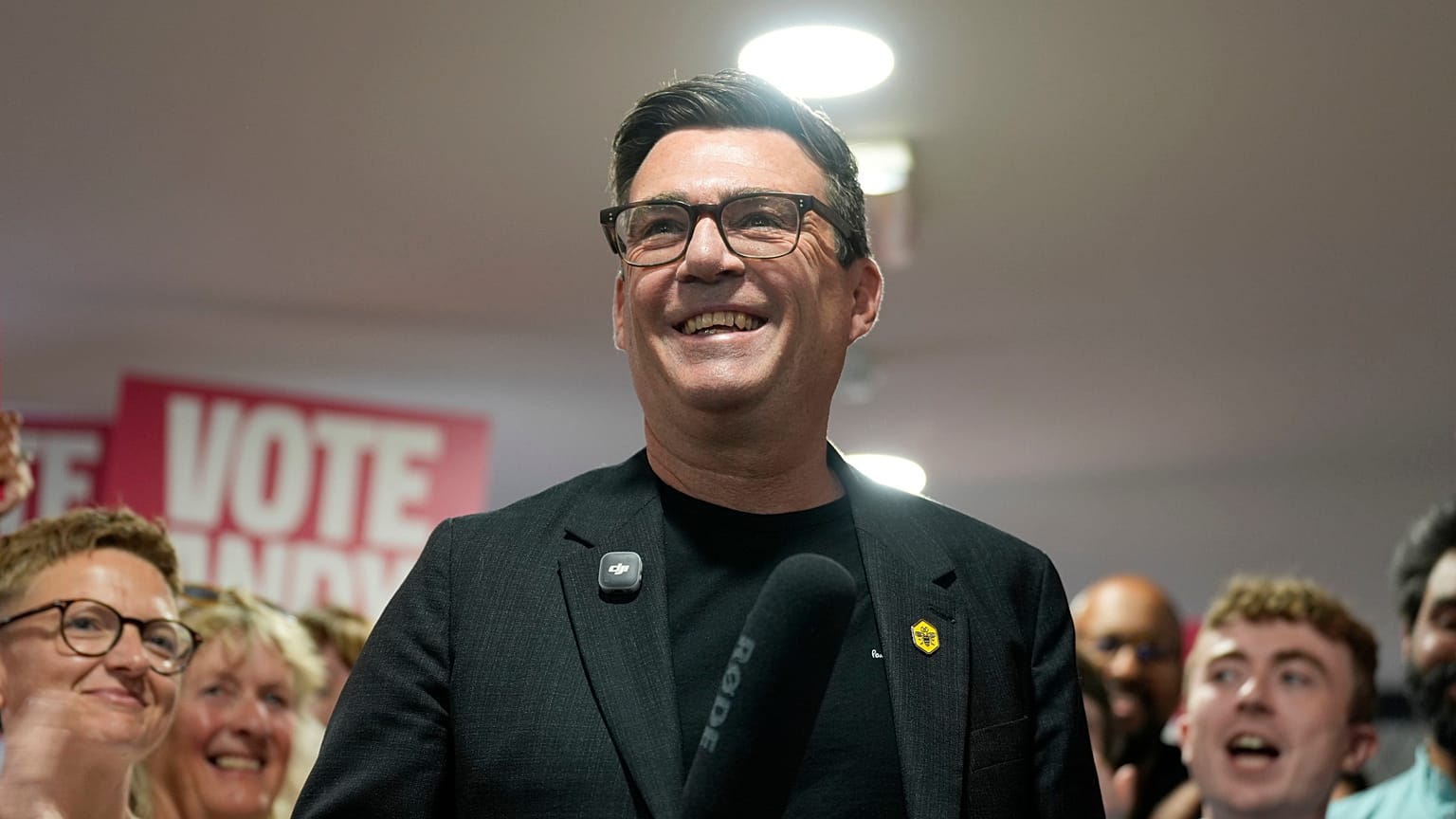 Andy Burnham delivers a speech at St Jude's ARLFC, in Wigan, England, Saturday June 13, 2026, as he campaigns ahead of the Makerfield by-election.