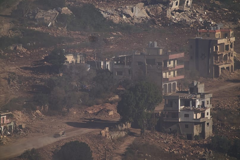 An Israeli military vehicle drives in southern Lebanon seen from northern Israel, Thursday, June 18, 2026