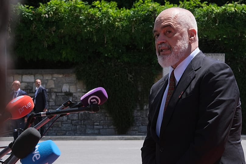 Albania's Prime Minister Edi Rama speaks with the media as he arrives for the EU-Western Balkans summit in Tivat, Montenegro, Friday, June 5, 2026.