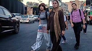 People walk along Tajrish square in northern Tehran, Monday, June 15, 2026.