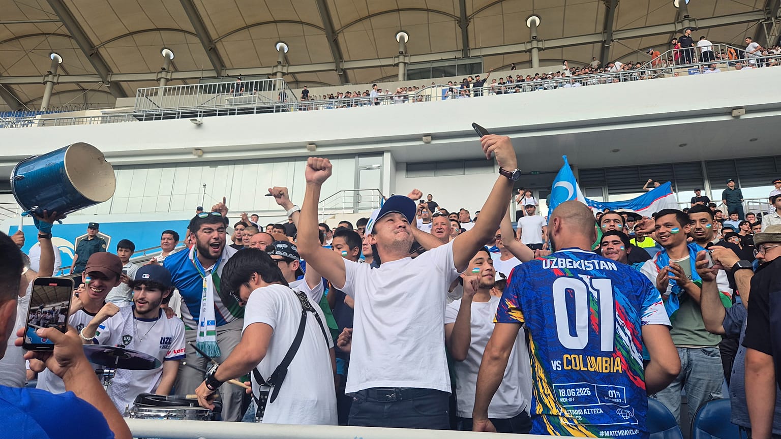 Uzbek fans celebrating the first ever goal of their national team in a World Cup