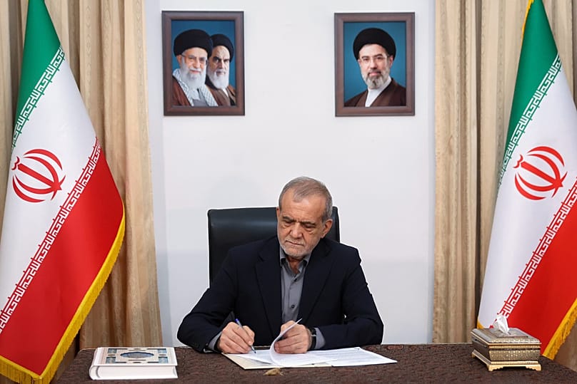 Iranian President Masoud Pezeshkian signs an MoU aimed at ending the war in Tehran, 18 June, 2026