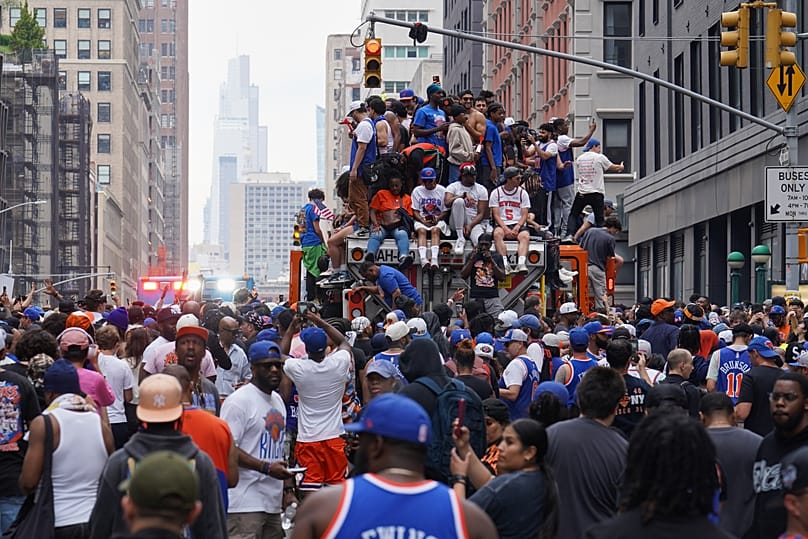 Fans celebrate during the New York Knicks' NBA championship parade in New York, 18 June, 2026