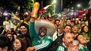 Mexican fans celebrate after beating South Korea during the World Cup Group A match, at the Angel of Independence monument in Mexico City, Thursday, June 18, 2026