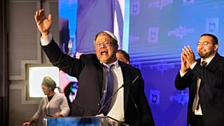  Israeli far-right lawmaker Itamar Ben-Gvir gestures after election exit poll results are released at his party's headquarters in Jerusalem on Nov. 2, 2022.