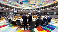 European Council President Antonio Costa, right, talks to French President Emmanuel Macron during a round table meeting at the EU summit in Brussels, Friday, June 19, 2026.