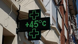 File - A pharmacy displays the temperature, 45 degrees Celsius, in Lille, France, 19 July 2022.