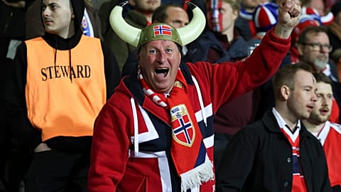 A Norway fan cheers during a Group I, World Cup qualifier soccer match between Moldova and Norway at the Zimbru stadium in Chisinau, Moldova, Saturday, March 22, 2025.