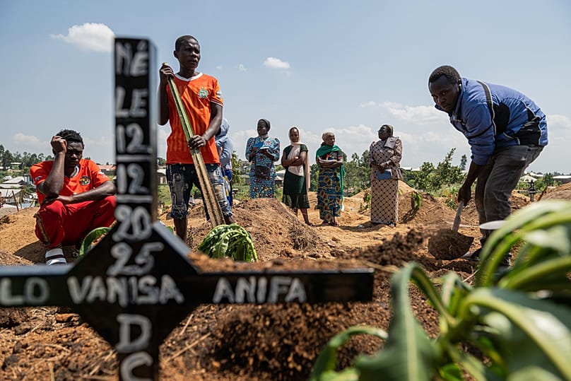 Relatives of Vanisa Anifa, a 6-month-old orphaned girl who died of Ebola, attend her burial, in Bunia, Congo, Friday, June 19, 2026.