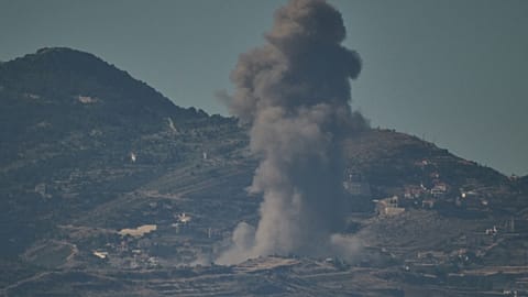 Smoke rises to the sky following an Israeli military strike in southern Lebanon as seen from northern Israel, Friday, June 19, 2026.