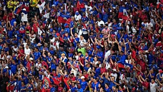 Brazil and Haiti fans celebrate together after World Cup match 