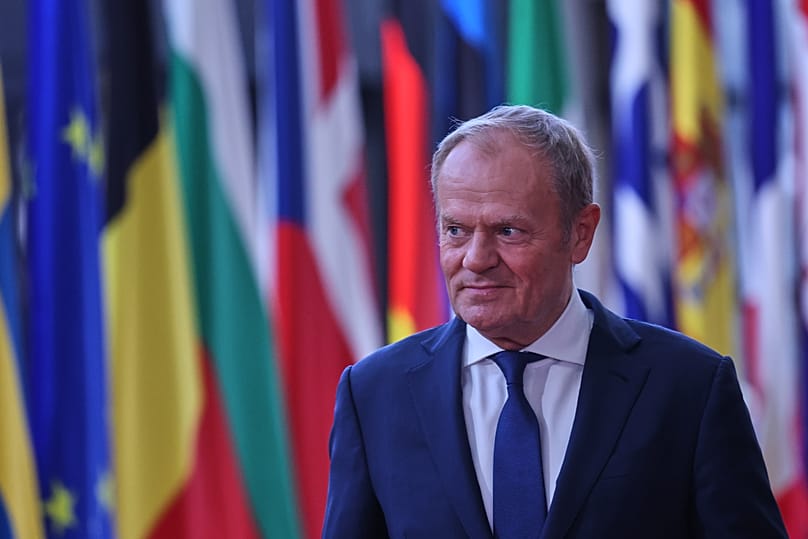 Poland's Prime Minister Donald Tusk arrives for the EU summit in Brussels, Thursday, June 18, 2026. 