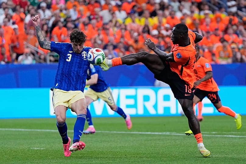 Netherlands' Brian Brobbey vies for the ball with Sweden's Victor Lindelof during the World Cup match between the Netherlands and Sweden in Houston, Saturday, June 20, 2026.