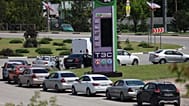 Cars line up at a petrol station in Simferopol, Crimea, Friday, June 12, 2026.