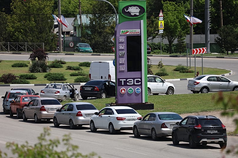Cars line up at a petrol station in Simferopol, Crimea, Ukraine, Friday, June 12, 2026.