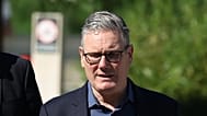 Britain's Prime Minister Keir Starmer walks, as he visits a housing development in north London, Friday, 19 June 2026. 