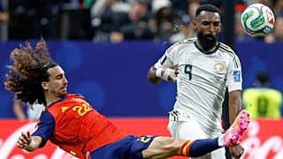 Spain's Marc Cucurella and Saudi Arabia's Feras Albrikan vie for the ball during the World Cup Group H match in Atlanta, Sunday, June 21, 2026